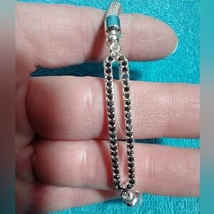 Elegant Silvertone Mesh Stretch and Black Crystal Bracelet